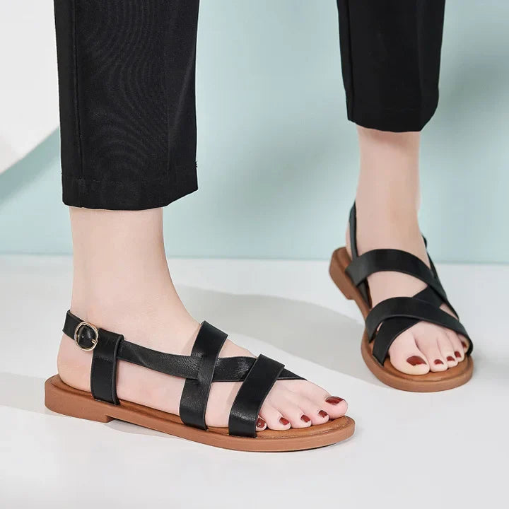 Gladiatorsandalen aus Leder für Damen mit flacher seitlicher Schnalle