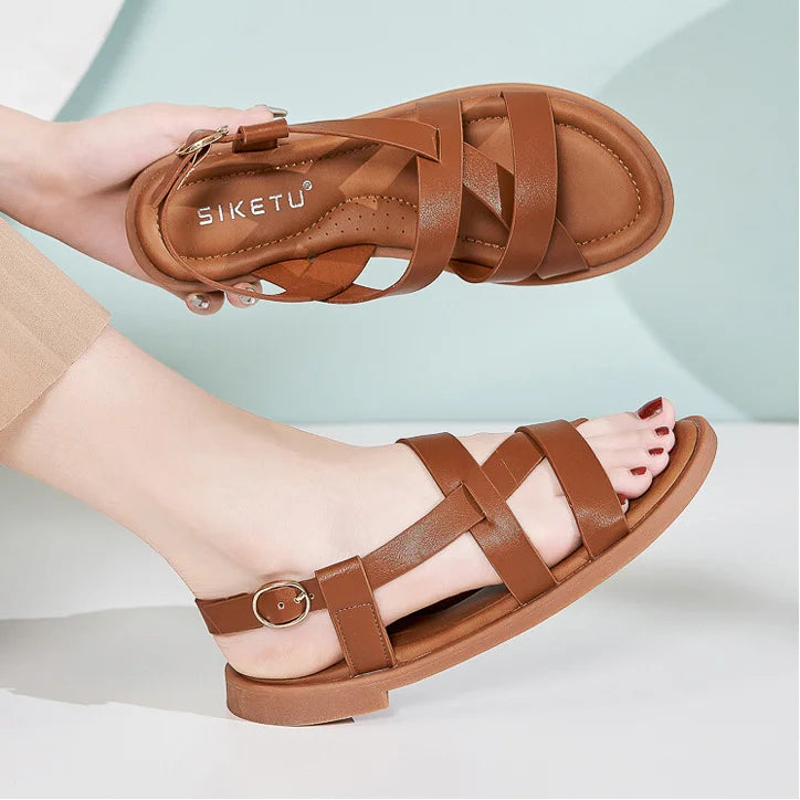 Gladiatorsandalen aus Leder für Damen mit flacher seitlicher Schnalle