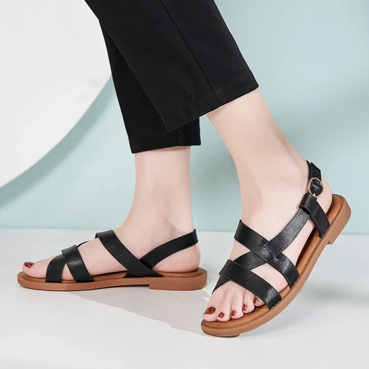 Gladiatorsandalen aus Leder für Damen mit flacher seitlicher Schnalle