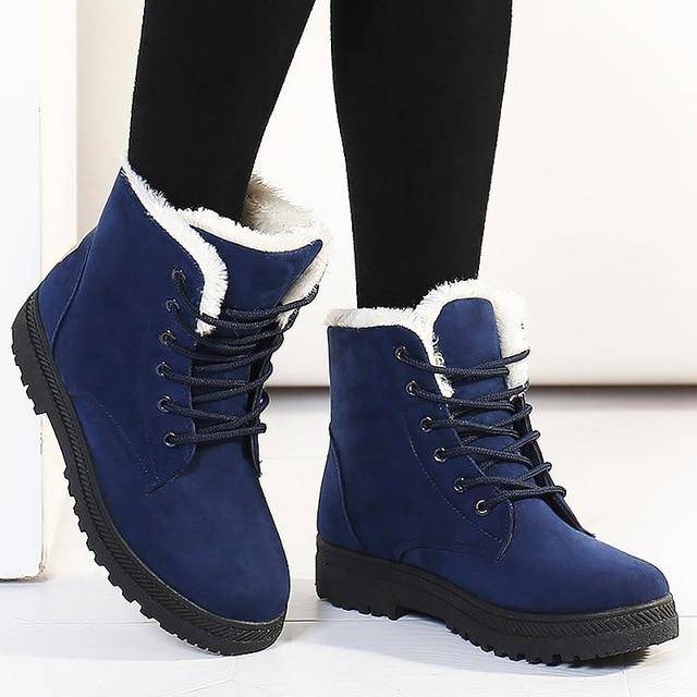 Warme mit Pelz gefütterte Stiefeletten